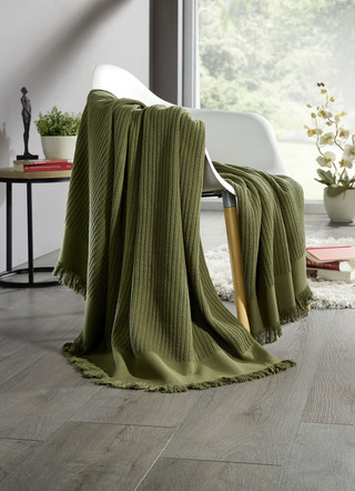 Deken en kussensloop in een leuke gebreide look