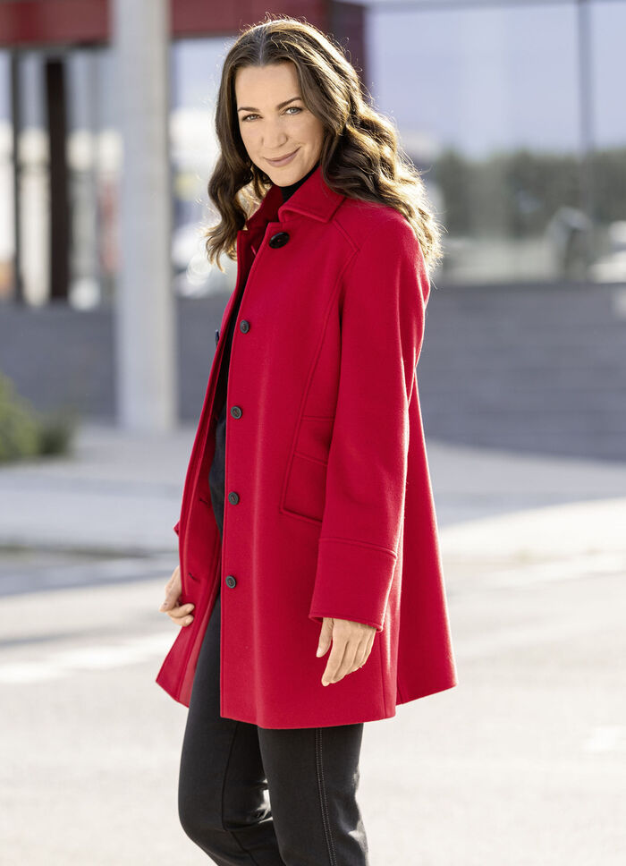 Lange jas met stijlvol verborgen knoopsluiting 