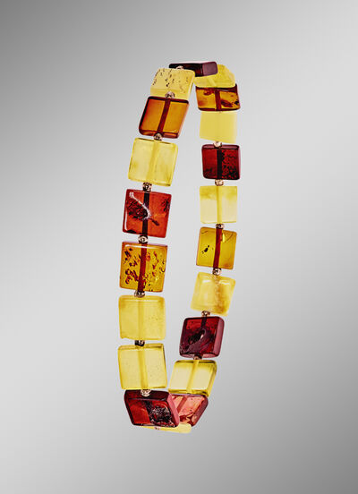 Toffe armband met bonte, vierkante stukken echte barnsteen 