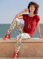 Broek met schitterende kleurenprint 