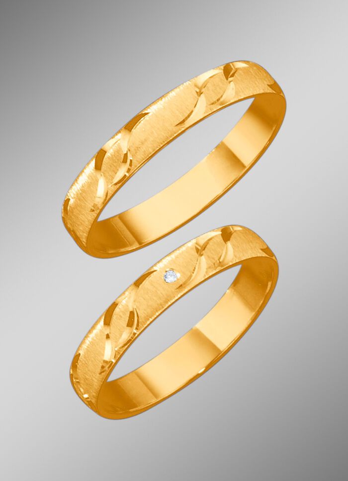 Trouwring met golfmotief 