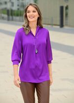 Tuniek met opvallende halslijn 