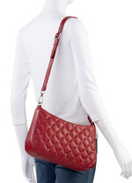 Laurina tas met trendy quilting en decoratieve klinknagels ROT