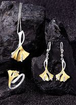 Damesring ginkgoblad in bicolor met synthetische zirkonia 