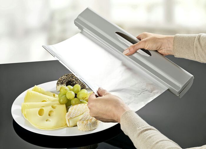 Foliedispenser met veermechanisme 