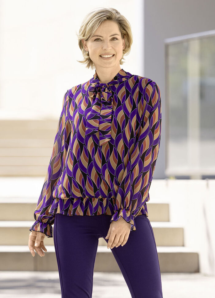 Prachtige blouse met strikbandjes 