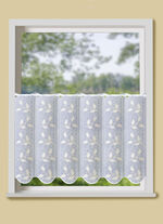 Kort gordijn met filigraan geborduurd bladmotief 