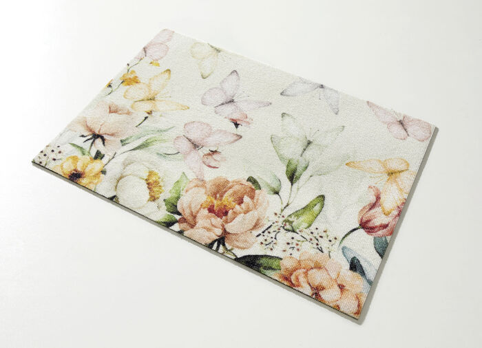 Aantrekkelijke deurmat met bloemen en vlinders 