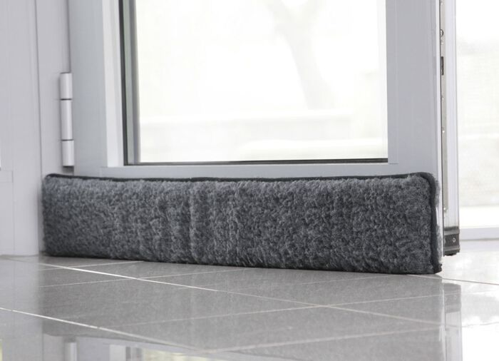 Nieuwe wollen tochtstrip voor deuren 