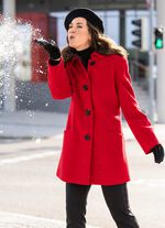 Lange jas met stijlvol verborgen knoopsluiting 