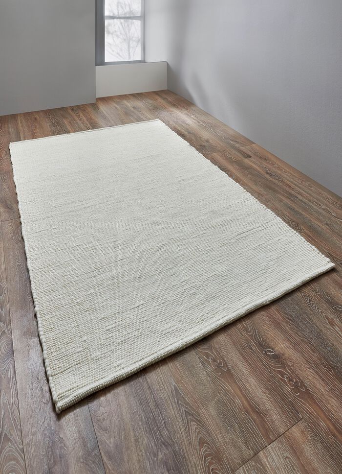 Handgeweven bruggen en tapijten van scheerwol 