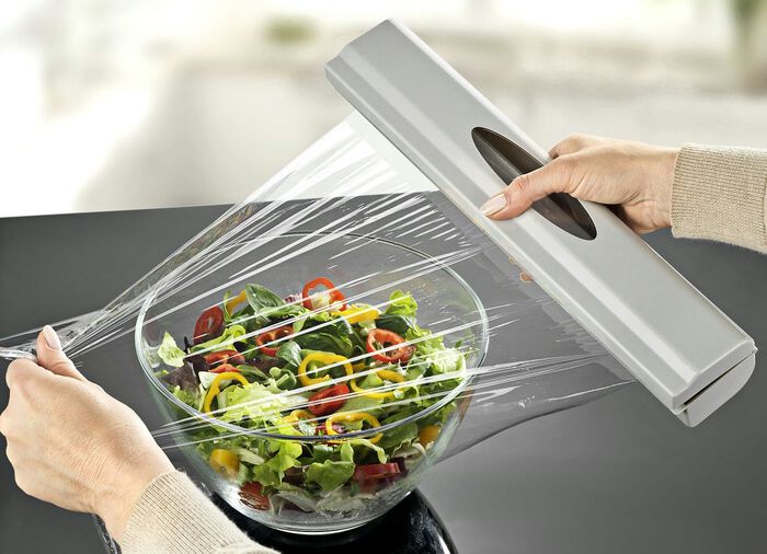 Foliedispenser met veermechanisme 