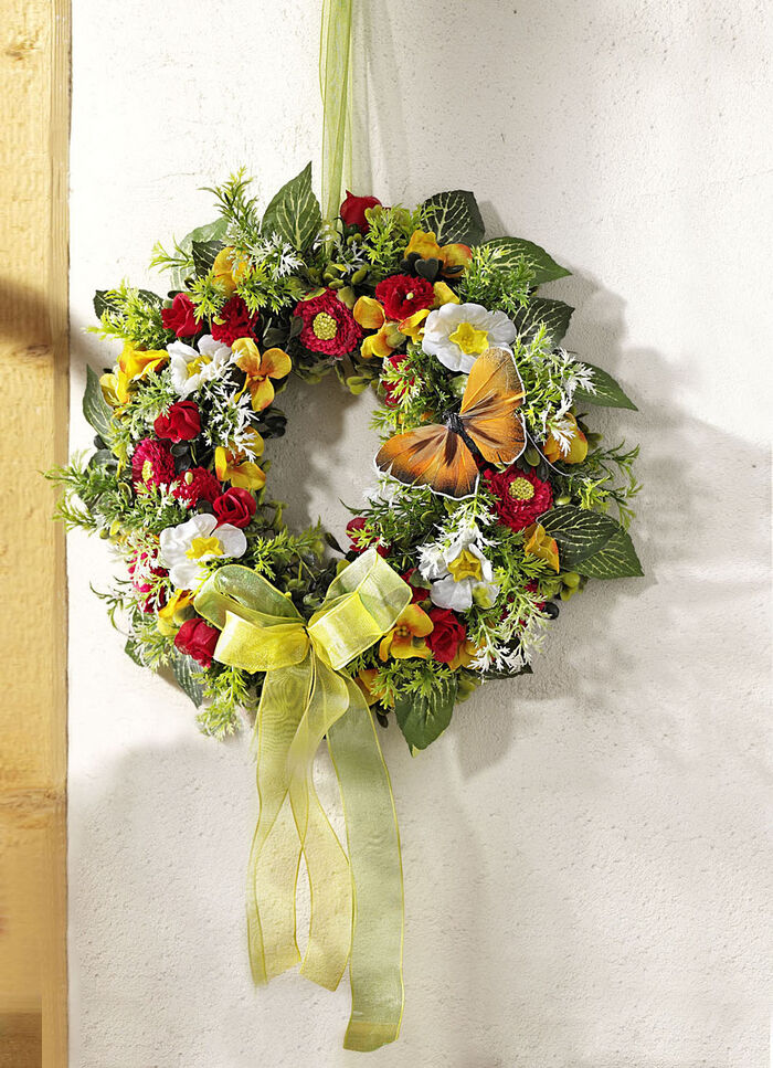 Wand- of deurdecoratie met voorjaarsbloemen 