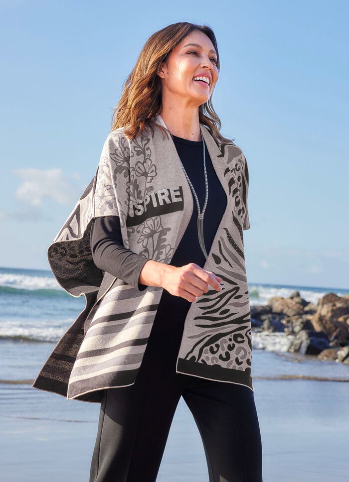 Poncho met elegant jacquarddesign 