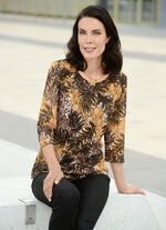 Tuniek met transparante mouwen 
