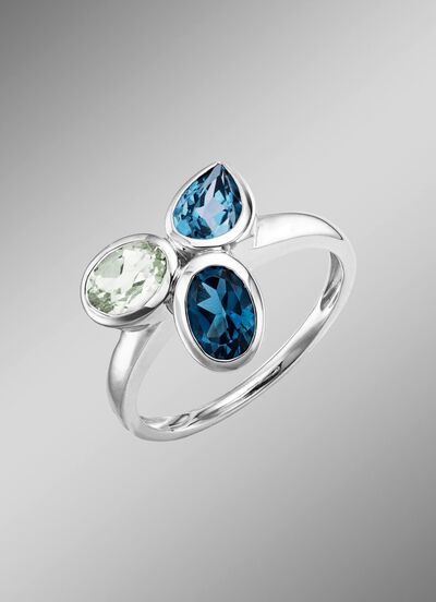 Harmonie van kleuren: damesring met blauwe topazen en groene amethist 