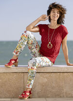 Broek met schitterende kleurenprint 