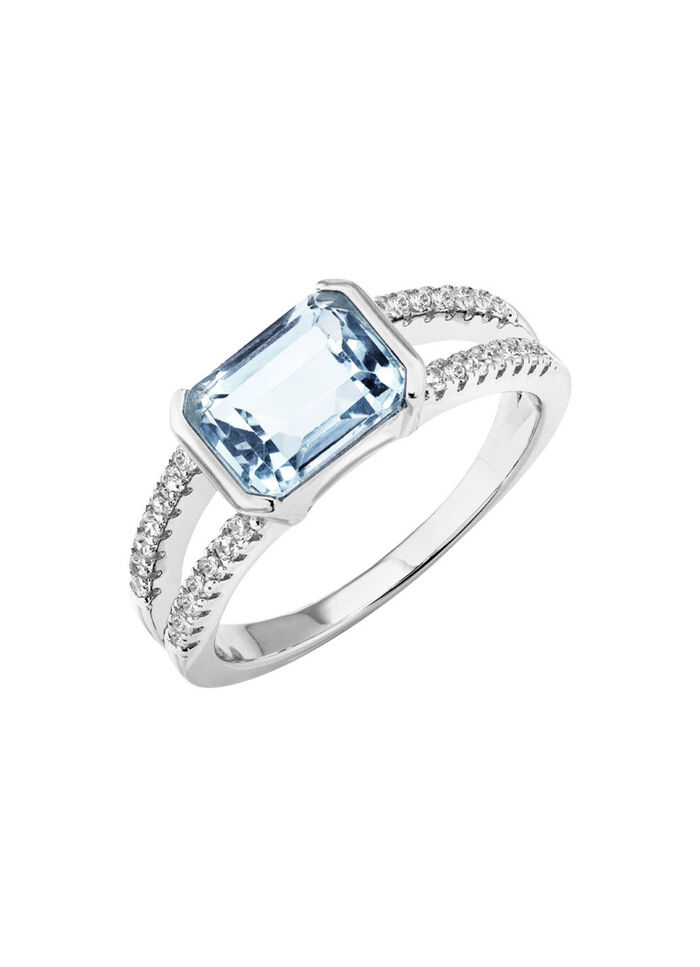 Elegantie ontmoet tijdloosheid: damesring met blauwe topaas en synthetische zirkonia 