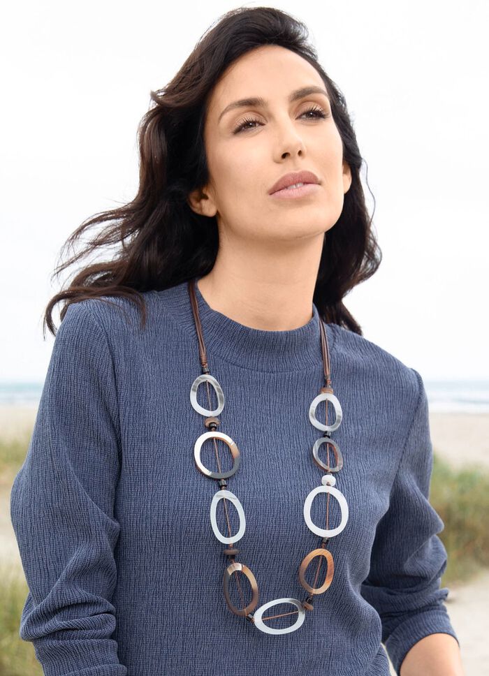 Moderne ketting met asymmetrische ovale elementen 