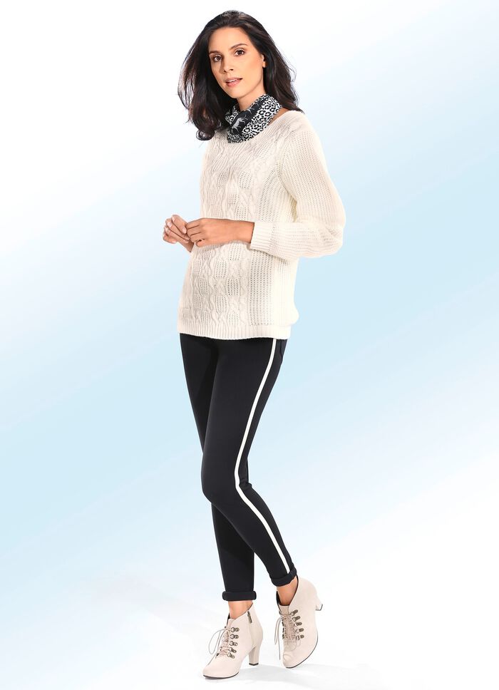 Legging met ecrukleurige sierrand 