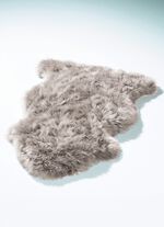 Mat van echte lamsvacht in dierenvorm 