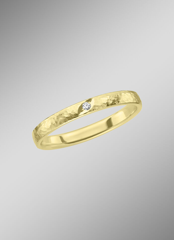 Trouwring in gehamerd design 