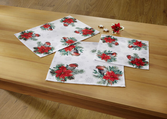 Tafel- en kamerdecoratie met schattige roodborstjes 