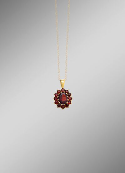 Bloemvormige hanger met granaat 