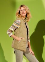 Gewatteerd vest met contrasterende biezen RIETGROEN