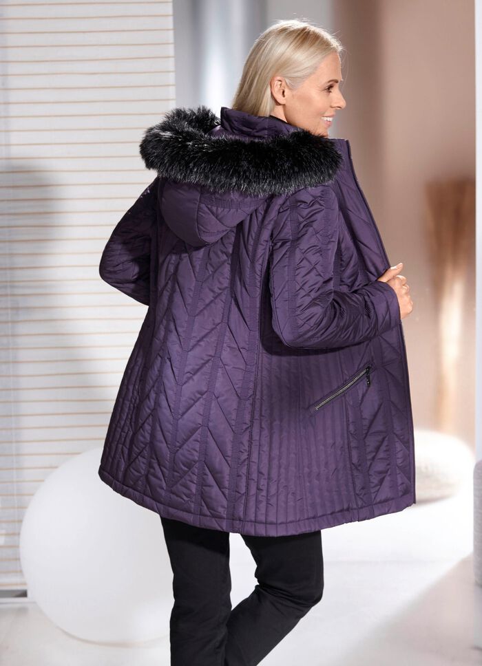 Jas met lengtestiksels aan de zijkanten 