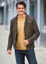 Korte leren jas met sierstiksel 