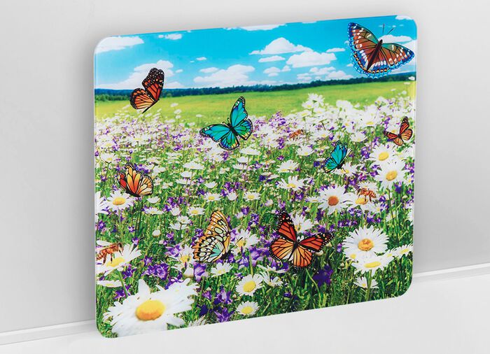 Wandpaneel van glas met zomerweidemotief 