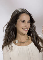 Goudkleurige ketting met bloem 