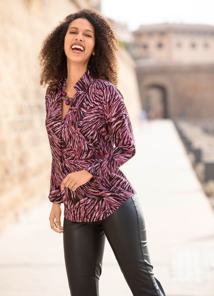 Tuniek met schitterende kleurenprint 