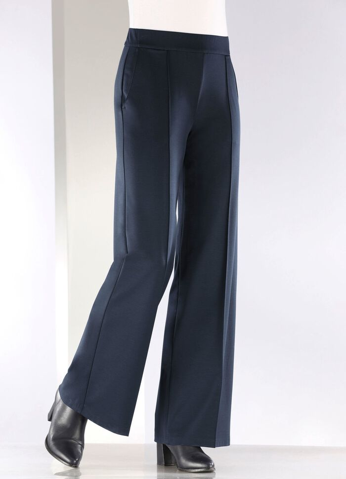 Broek met verlengende plooien 