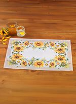 Tafel- en ruimtedecoratie met zonnebloemmotief 