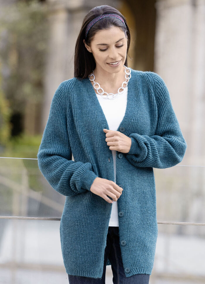 Lange cardigan met parelkwastje 