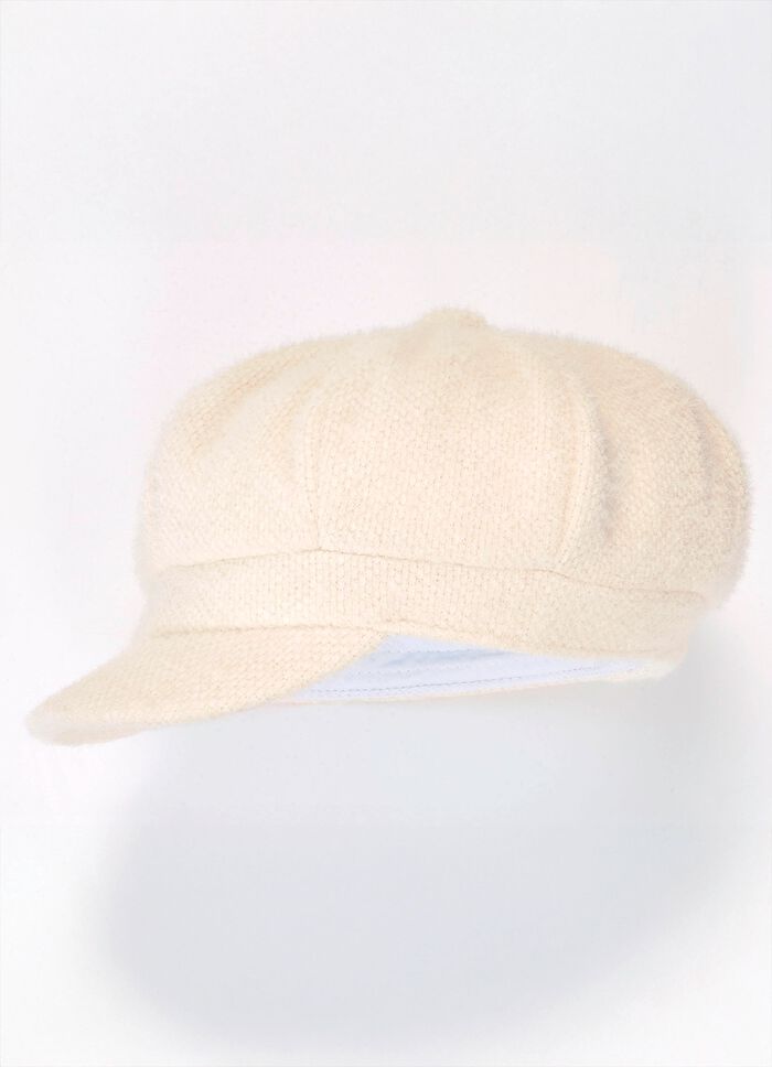 Elegante dames krantenjongenspet met elastiek aan de achterkant 