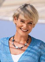 Ketting met diverse sieradenelementen 