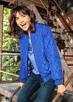 Omkeerbaar bloesje met geribbelde manchetten 