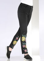 Jeans met handgeschilderde bloemmotieven 