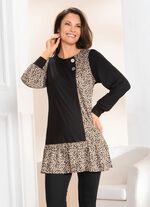 Extravagante tuniek met decoratieve knopen 